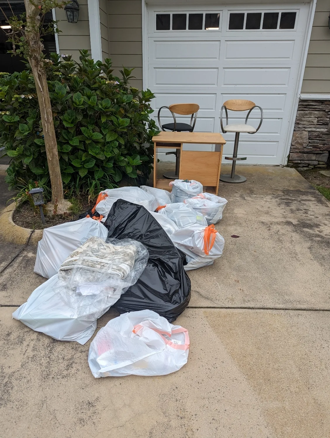 Move-out debris bagged and hauled from an Orange County apartment