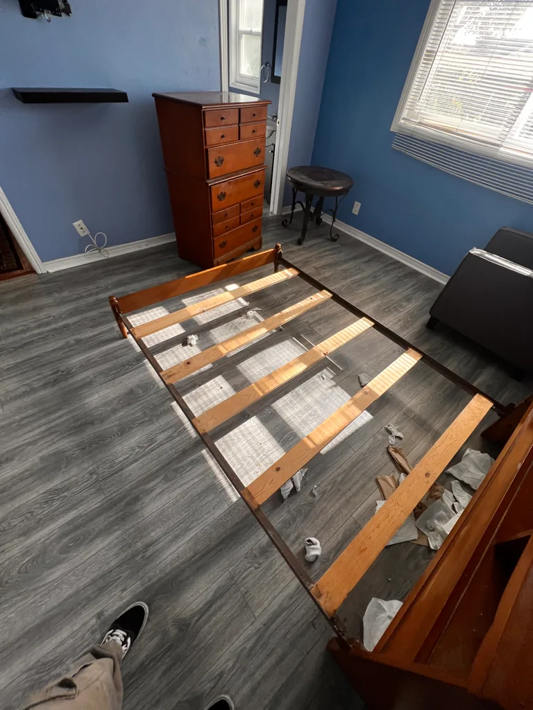 Old carpet and tack strips torn out down to the subfloor in Orange County, CA