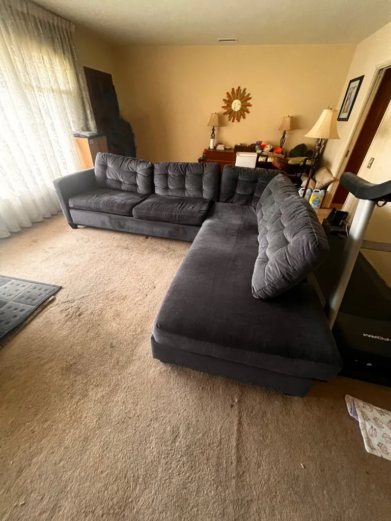 Large sectional sofa hauled from an Orange County living room