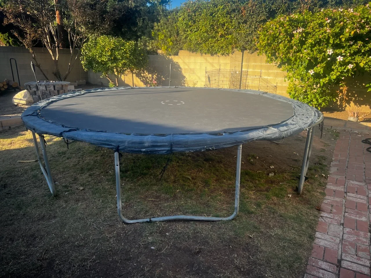 Backyard trampoline dismantled and hauled away in Orange County, CA